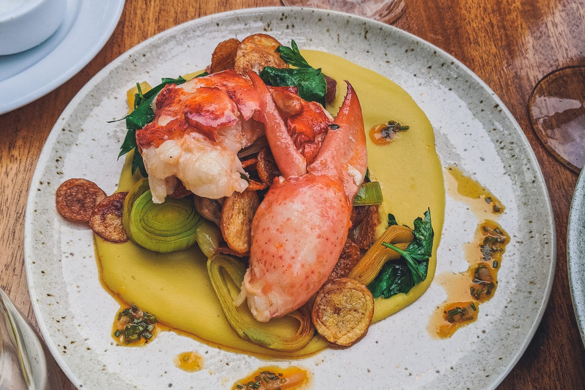 Savor the taste of Nantucket with a delicious lobster meal, showcasing the island's fresh, local catch.